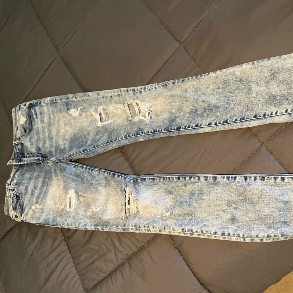 American Eagle-stacked skinny jeans “Young Money”